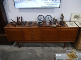 Mid century teak sideboard with 3 central drawers