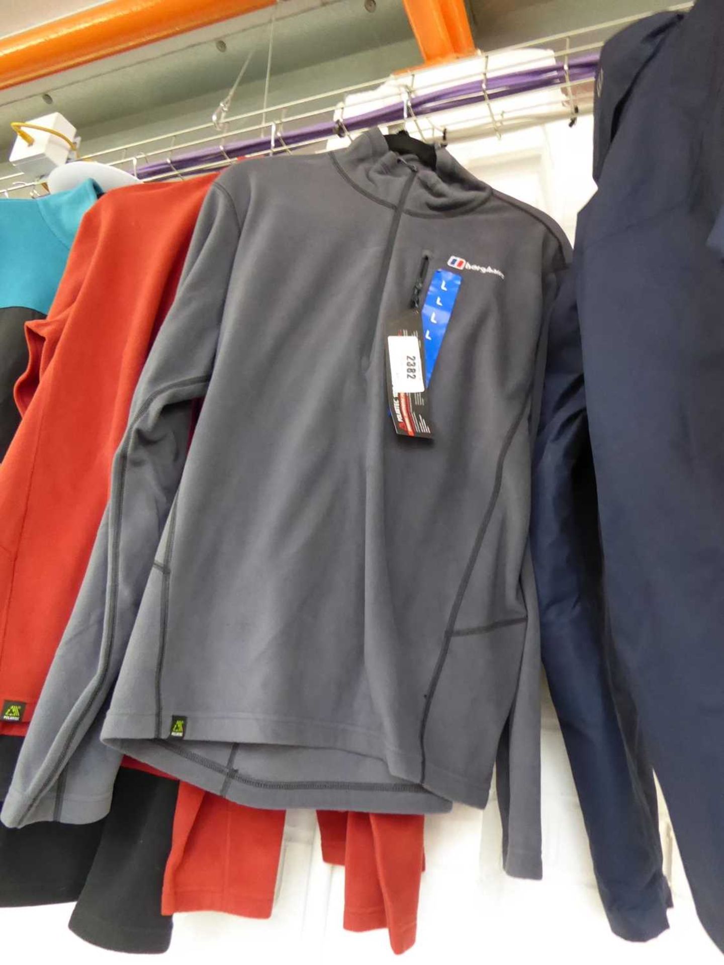 +VAT Berghaus half zip fleece in grey (size L), together with a Berghaus half zip fleece in red (
