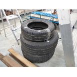 3 various sized tyres