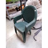 Set of 4 green plastic garden chairs