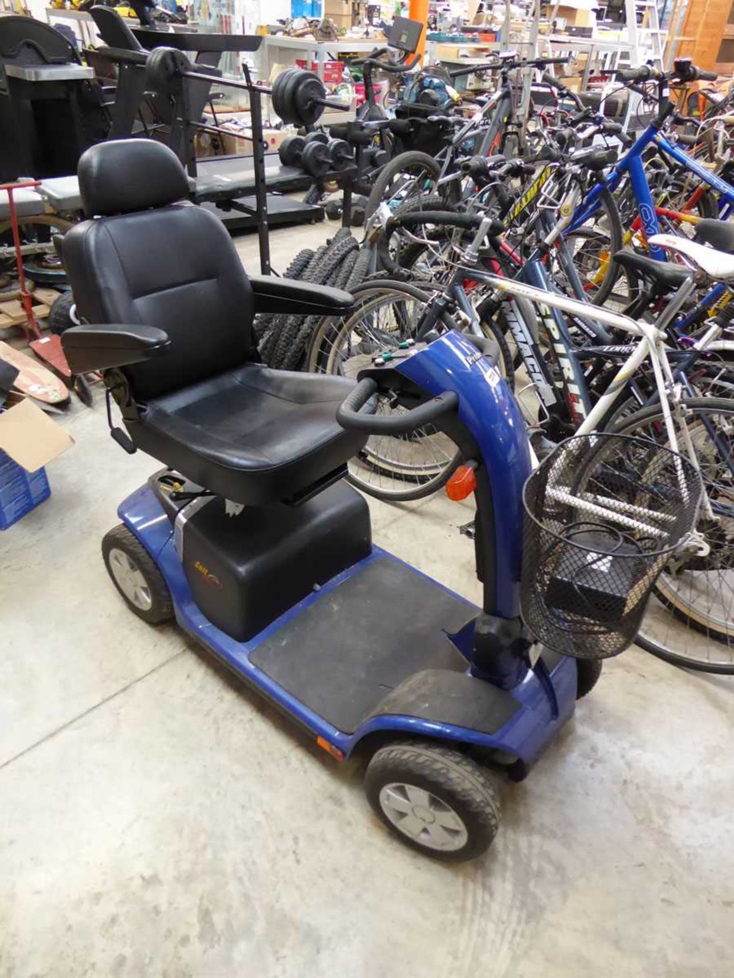 Colt Pride blue mobility scooter with key and charger