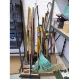 Large qty of outdoor garden hand tools to include brushes, rakes, spades, forks etc