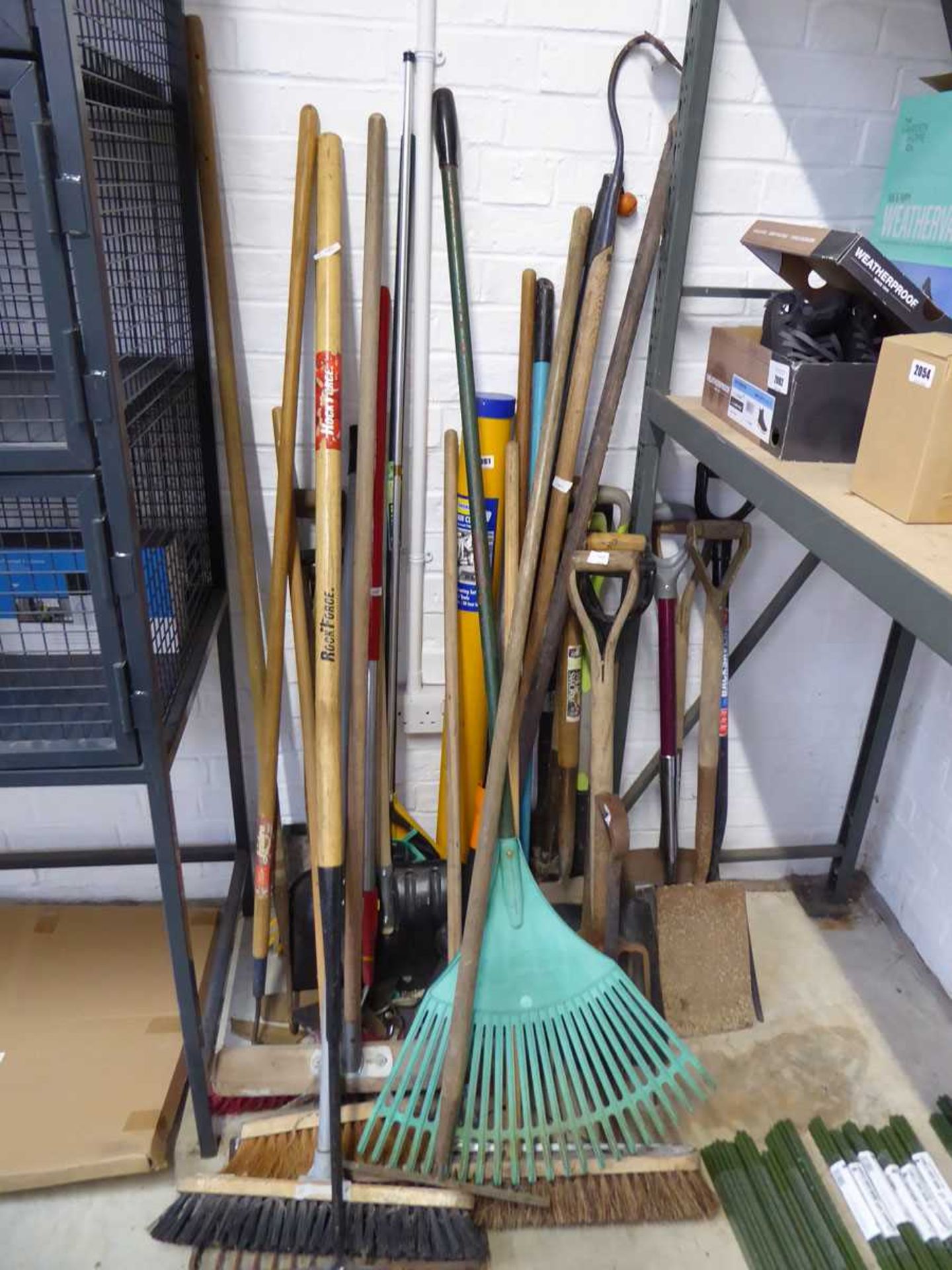 Large qty of outdoor garden hand tools to include brushes, rakes, spades, forks etc