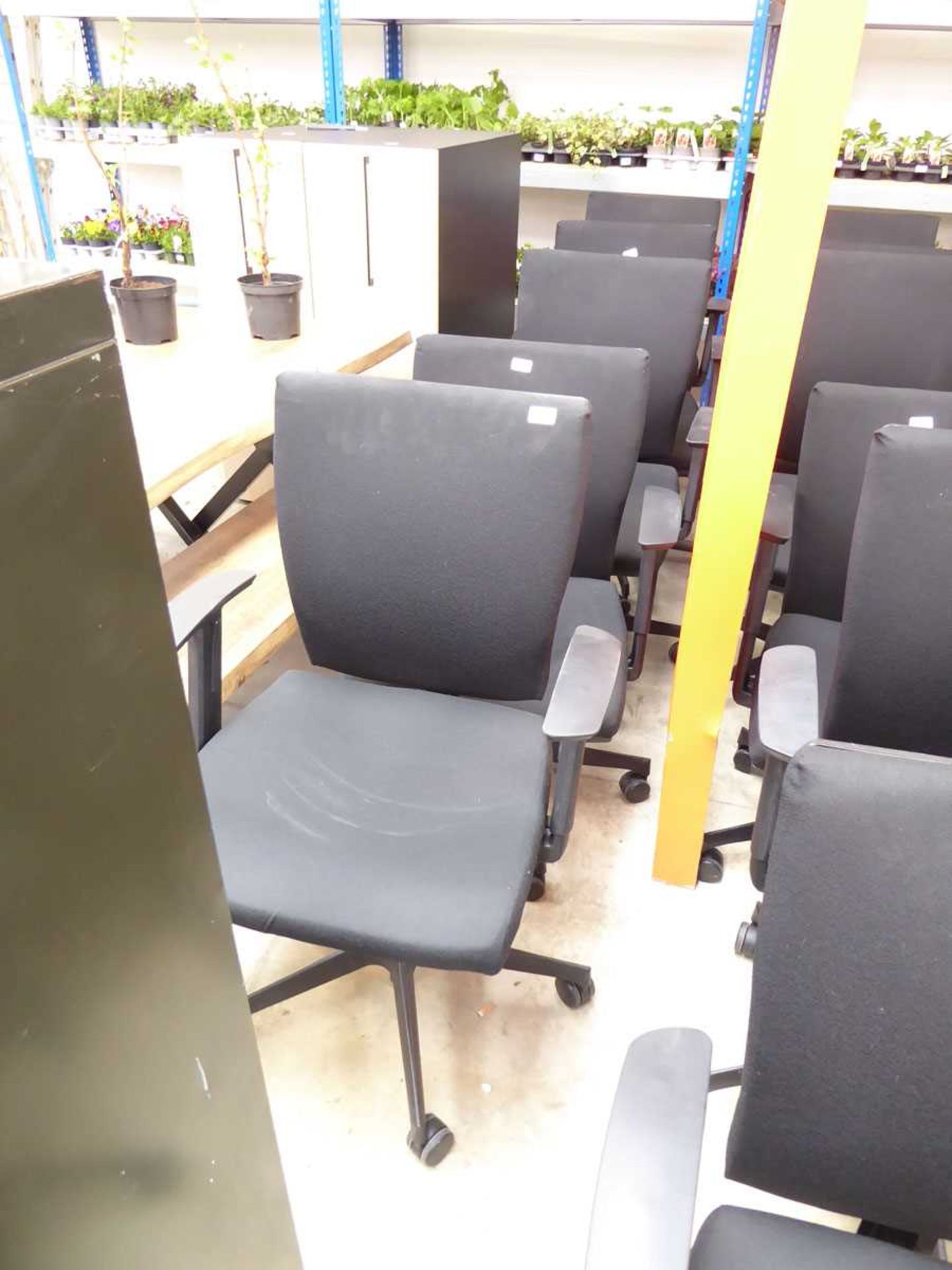 Set of 5 black fabric twin armed office chairs on 5 star base supports