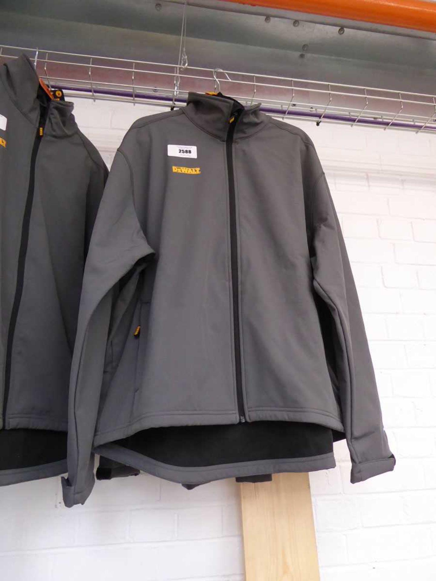 +VAT DeWalt full zip grey waterproof jacket (size XXL), together with a DeWalt quarter neck zip up