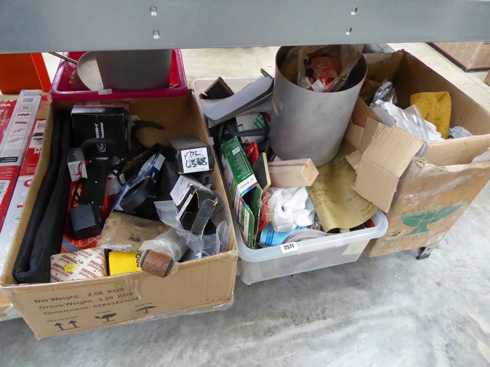 4 crates of various items to include sandpaper sheets, car related items