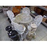 Weathered wrought iron 5 piece outdoor dining set comprising decorative circular table with 4