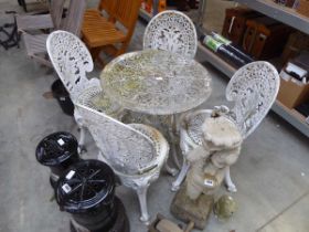 Weathered wrought iron 5 piece outdoor dining set comprising decorative circular table with 4