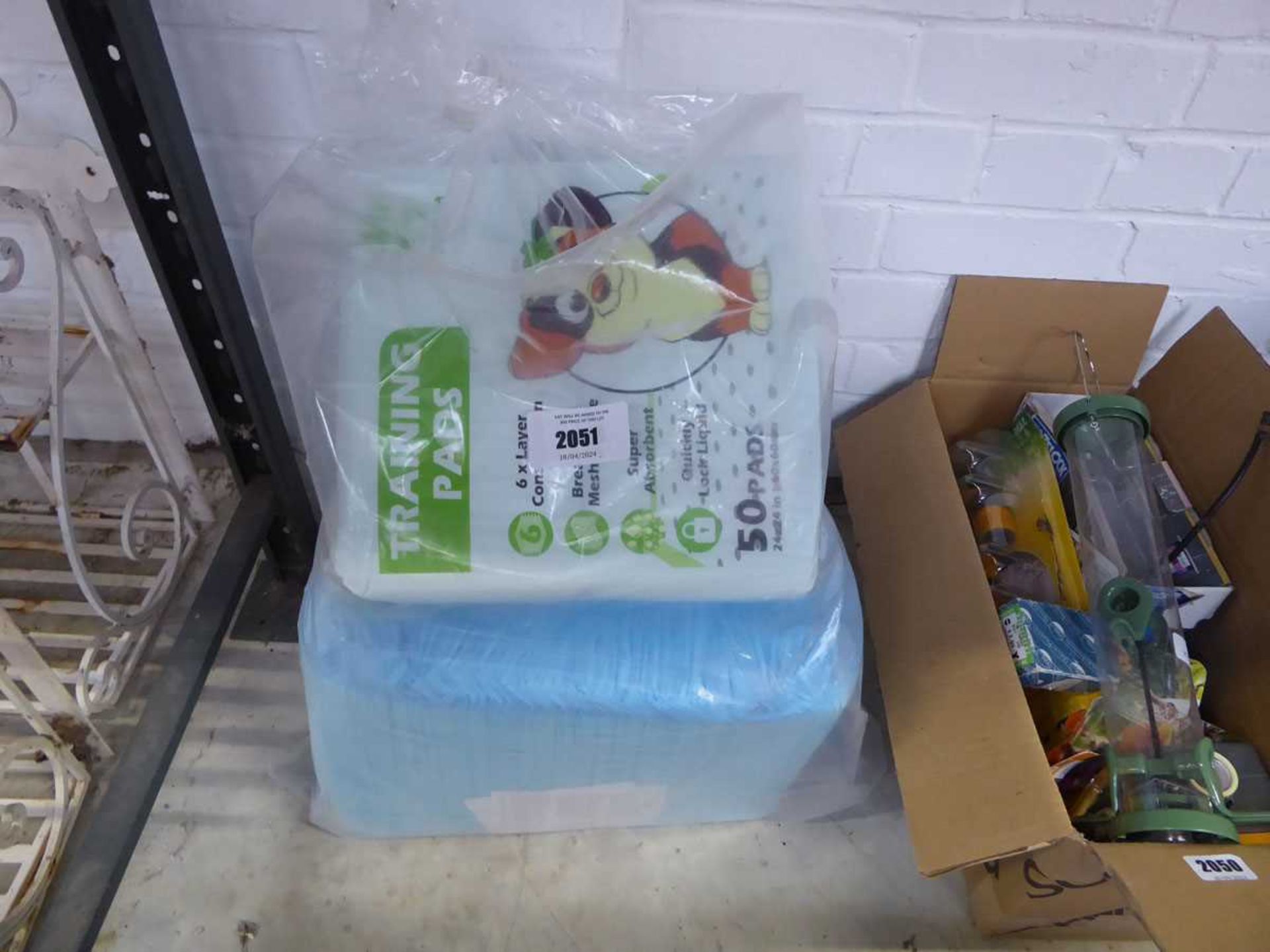 Bag of puppy training mats and pads
