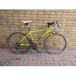 Carerra TDF.JR racing bike in black and yellow