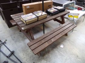 Wooden slatted picnic bench