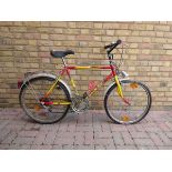 GX 2000 town bike in yellow and red
