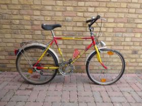 GX 2000 town bike in yellow and red