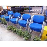 17 blue fabric stackable conference chairs on metal supports
