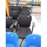 Set of 6 black fabric twin armed office chairs on 5 star base supports