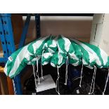 10 white and green striped beach umbrellas