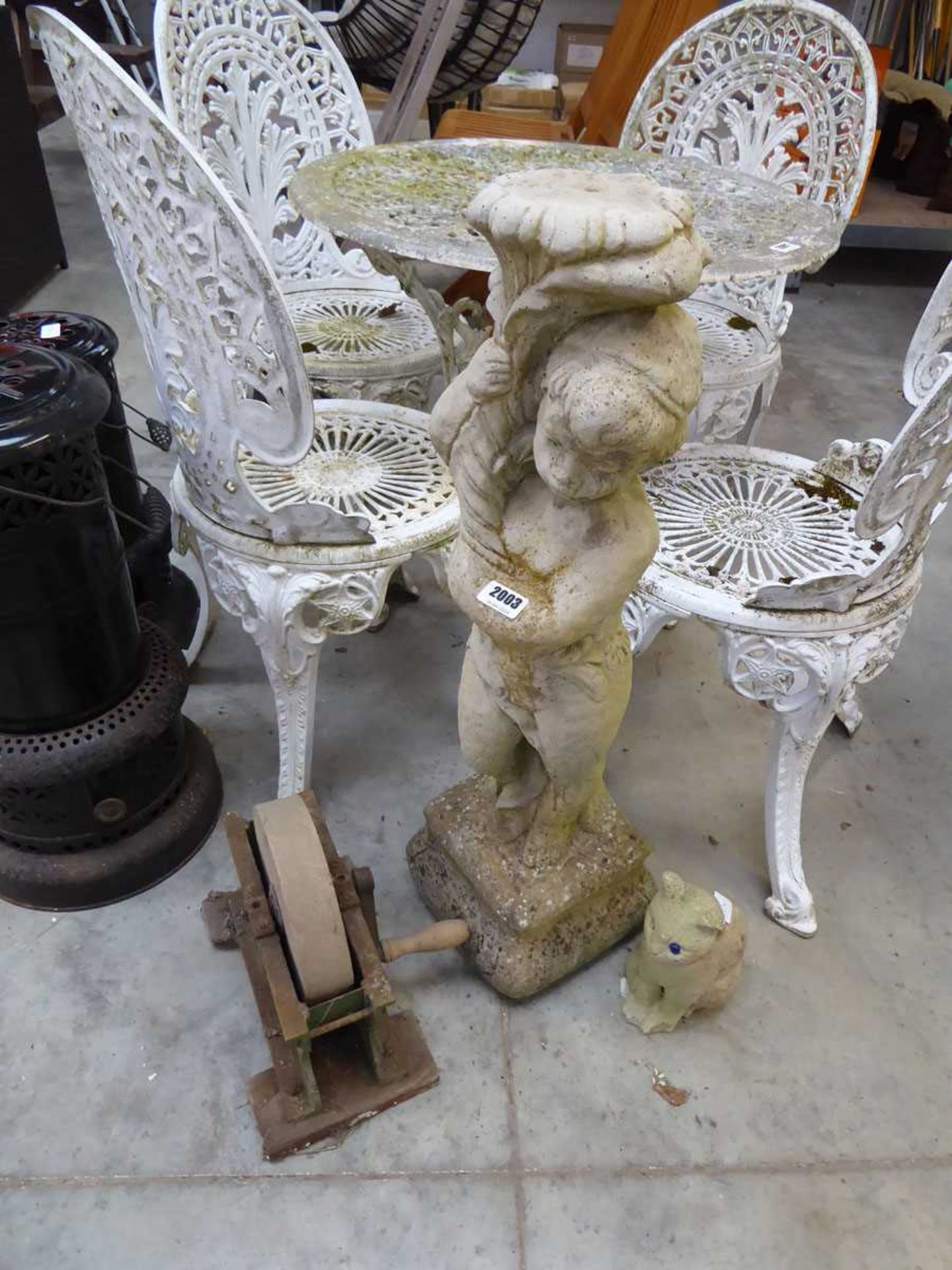 Concrete garden cherub together with small concrete cat and manual grinding wheel