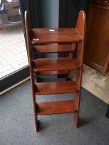 Set of folding mahogany library steps with brass inlay