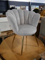 Modem grey upholstered shell shaped dining chair on brass finish legs