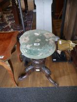 Carved mahogany piano stool with adjustable green upholstered seat