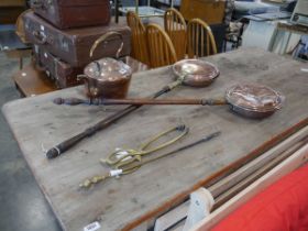 Collection of copper and brassware including long brass fire tongs, poker, 2 bed warming pans and