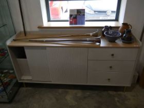 Modern light grey sideboard with sliding ribbed doors and 3 drawers and light oak surface
