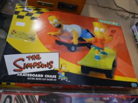 Simpsons skateboard chase scalextric set