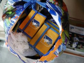 Bag containing qty of pre-owned football scarves, wallets etc together with football programs and