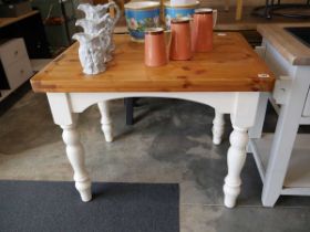 Pine kitchen table on white painted support