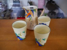 3 hand painted Grays pottery tumblers of Susie Cooper design together with a similar scotch ivory