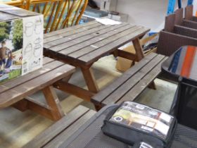 Wooden slatted picnic bench