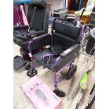 Black and purple collapsible 4 wheeled wheelchair