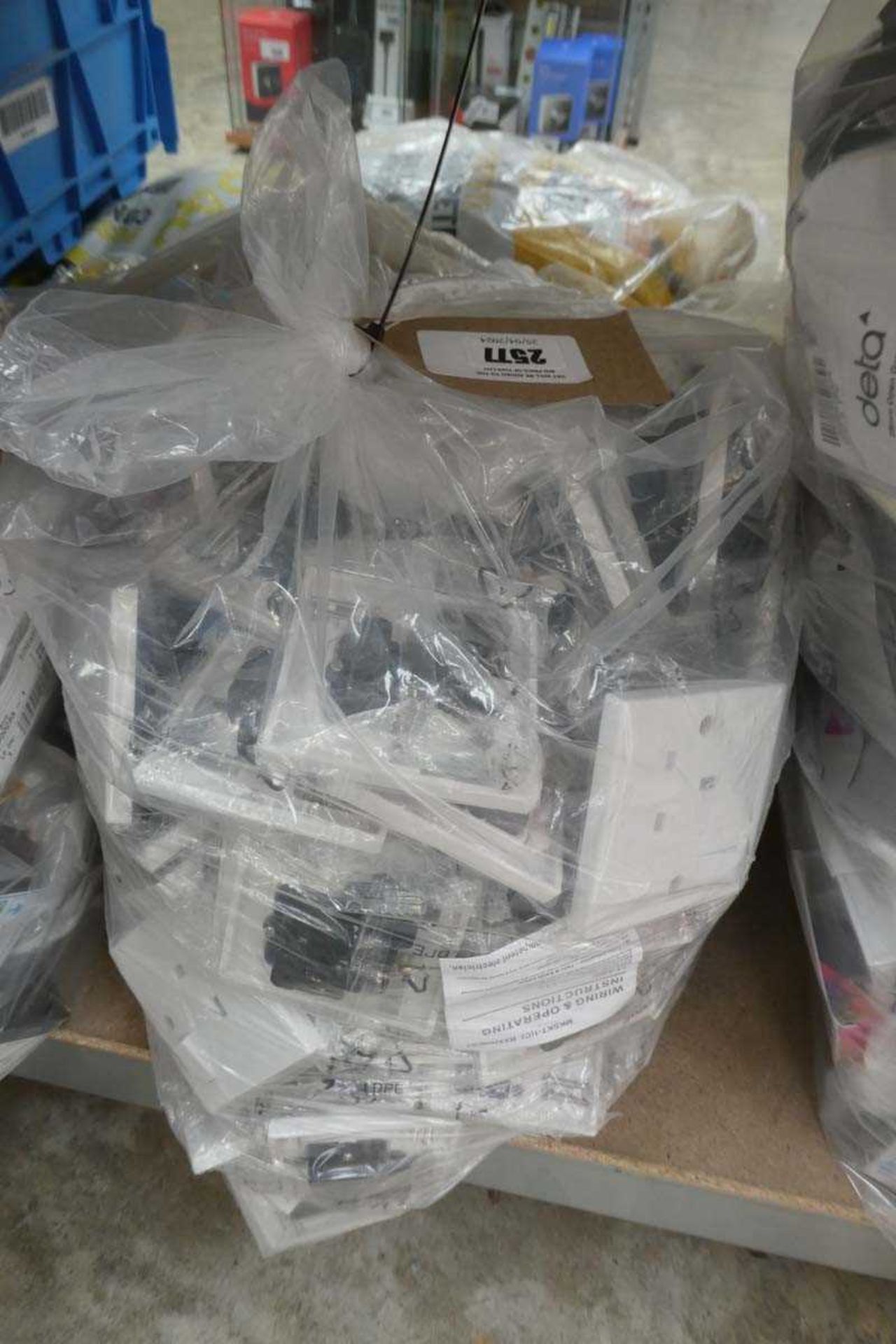 +VAT Bag containing large quantity of single switches and sockets