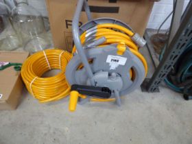 +VAT Titan hose on reel, together with a spare hose