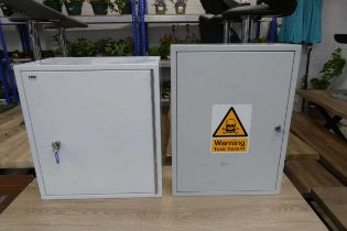 2 wall mounted lockable cabinets