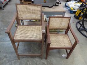 2 various wooden framed garden chairs each with bamboo style inserts