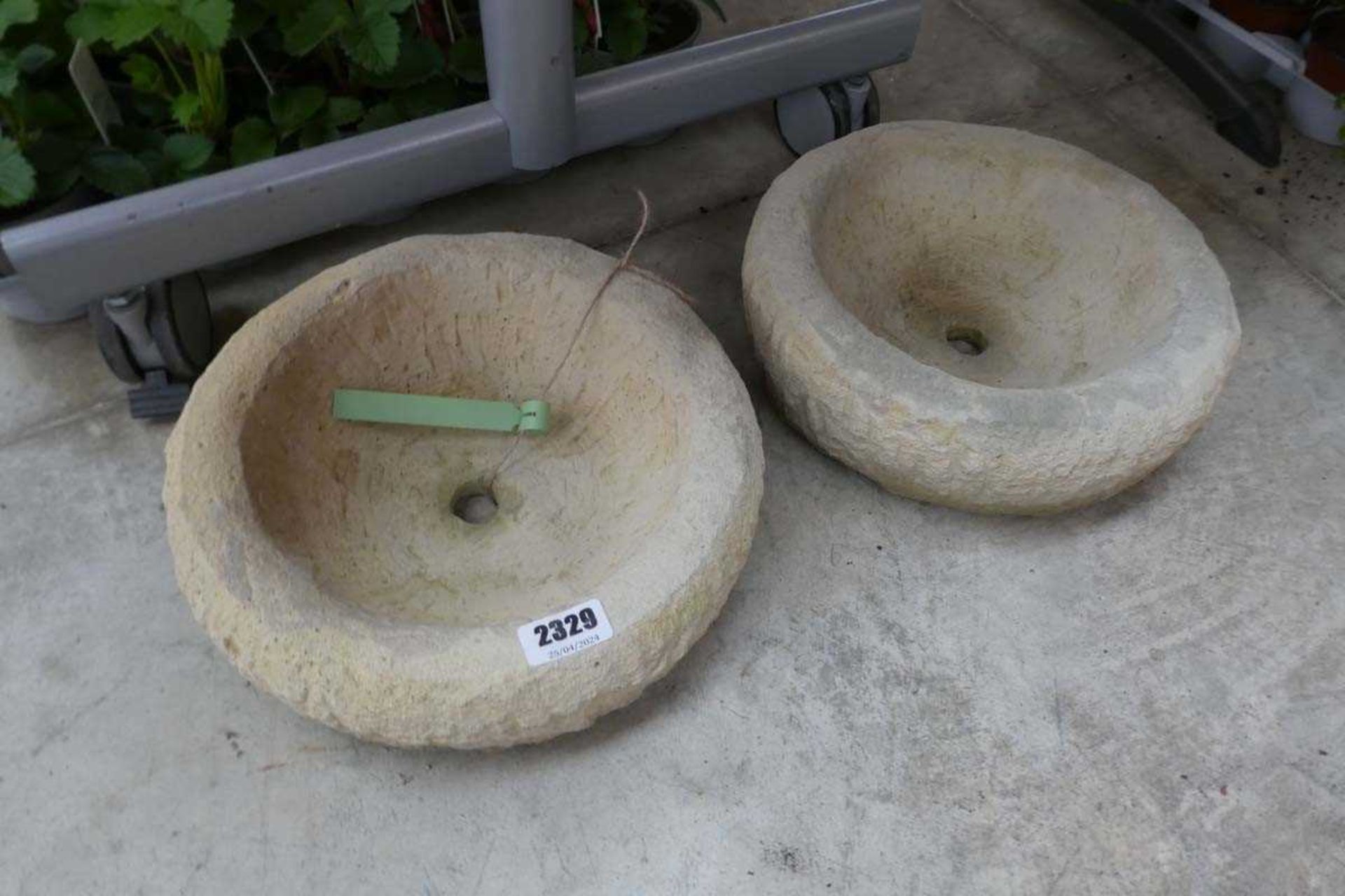 Pair of concrete shallow circular planters