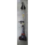 Petrol bent arm strimmer