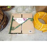 Box containing 10 x 12in. green hanging basket brackets