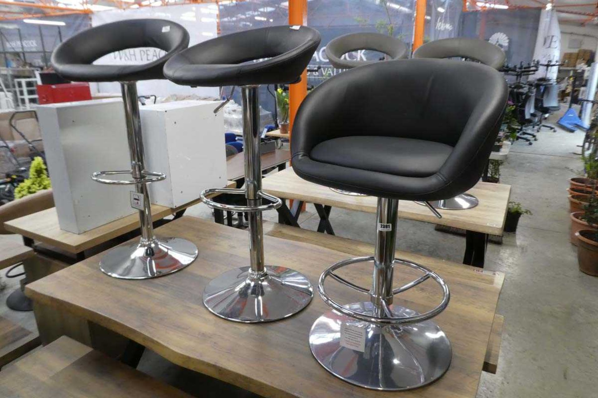3 black leatherette and chrome height adjustable bar stools