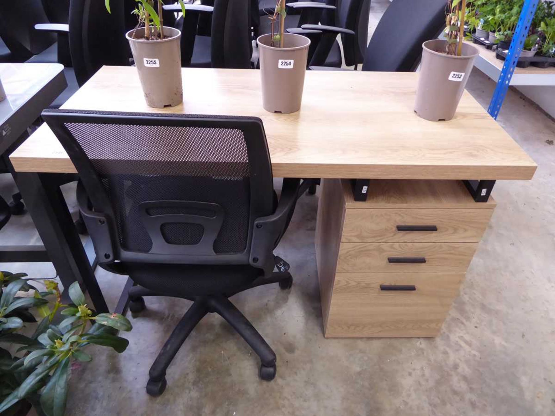 Wood effect 3 drawer desk with black meshed office armchair