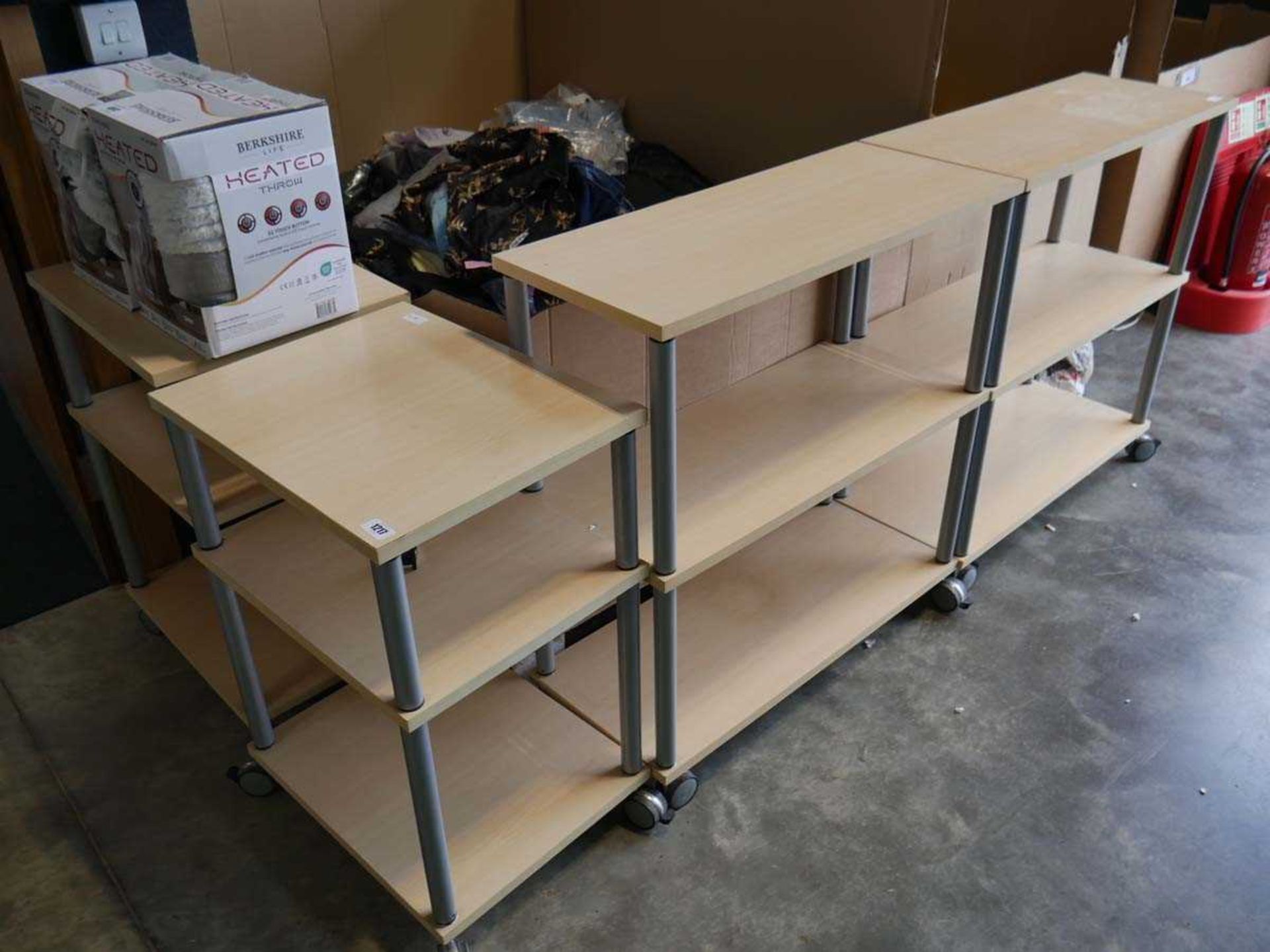 Collection of beech effect 3 tier shelving units on castors