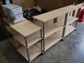 Collection of beech effect 3 tier shelving units on castors