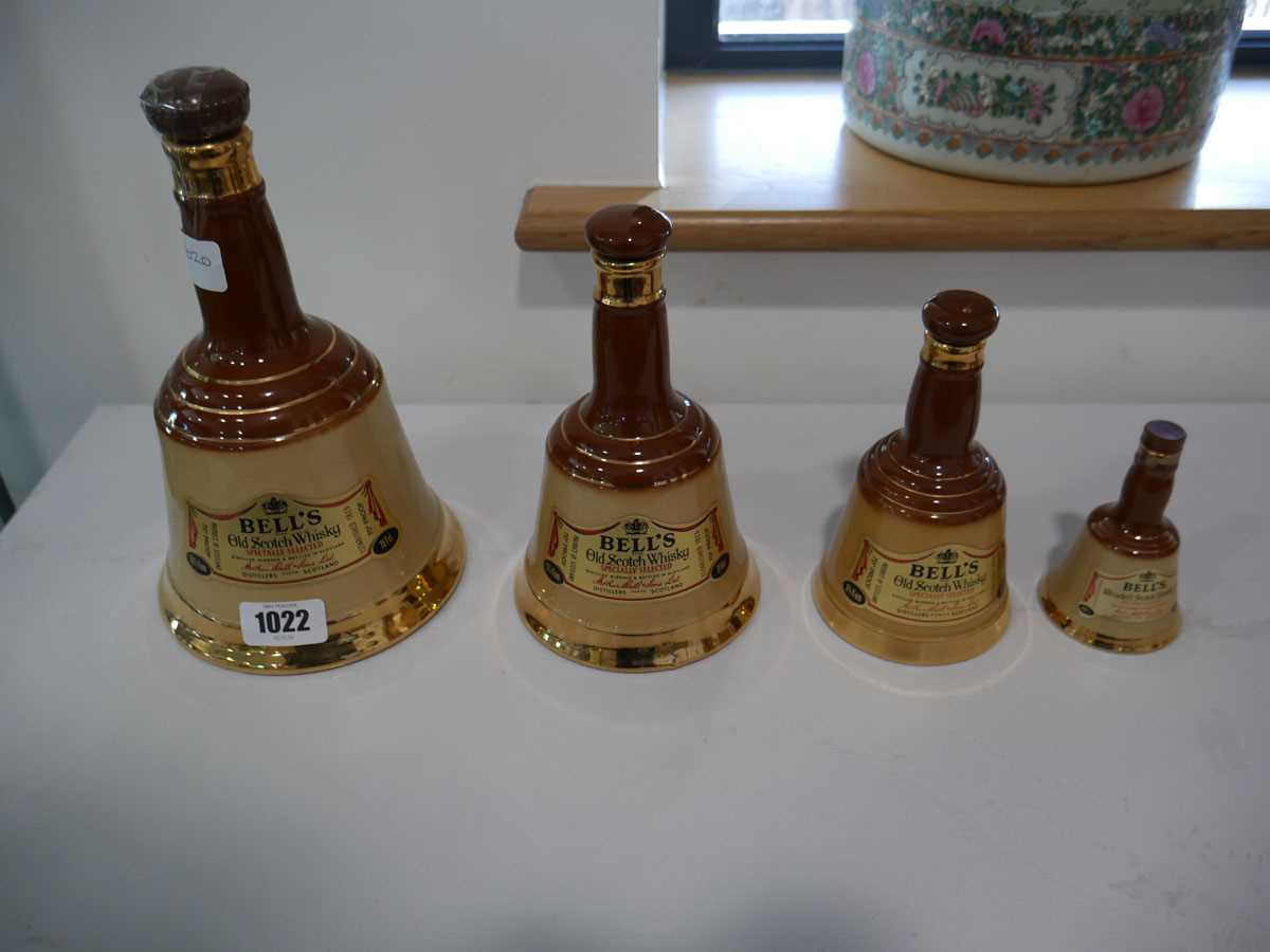 Graduated set of Wade Bells whisky empty decanters