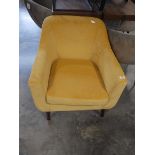 Yellow suede upholstered easy chair