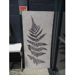 Large piece of wall art with a fern pattern