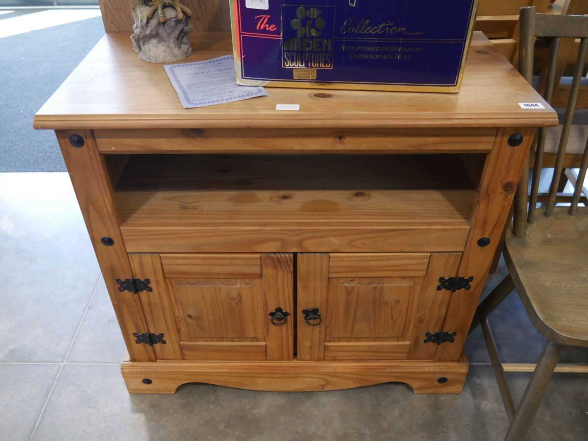 Modern pine entertainment stand with cupboard storage under