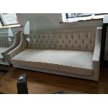 +VAT Low level beige upholstered button back sofa on black plinth type base