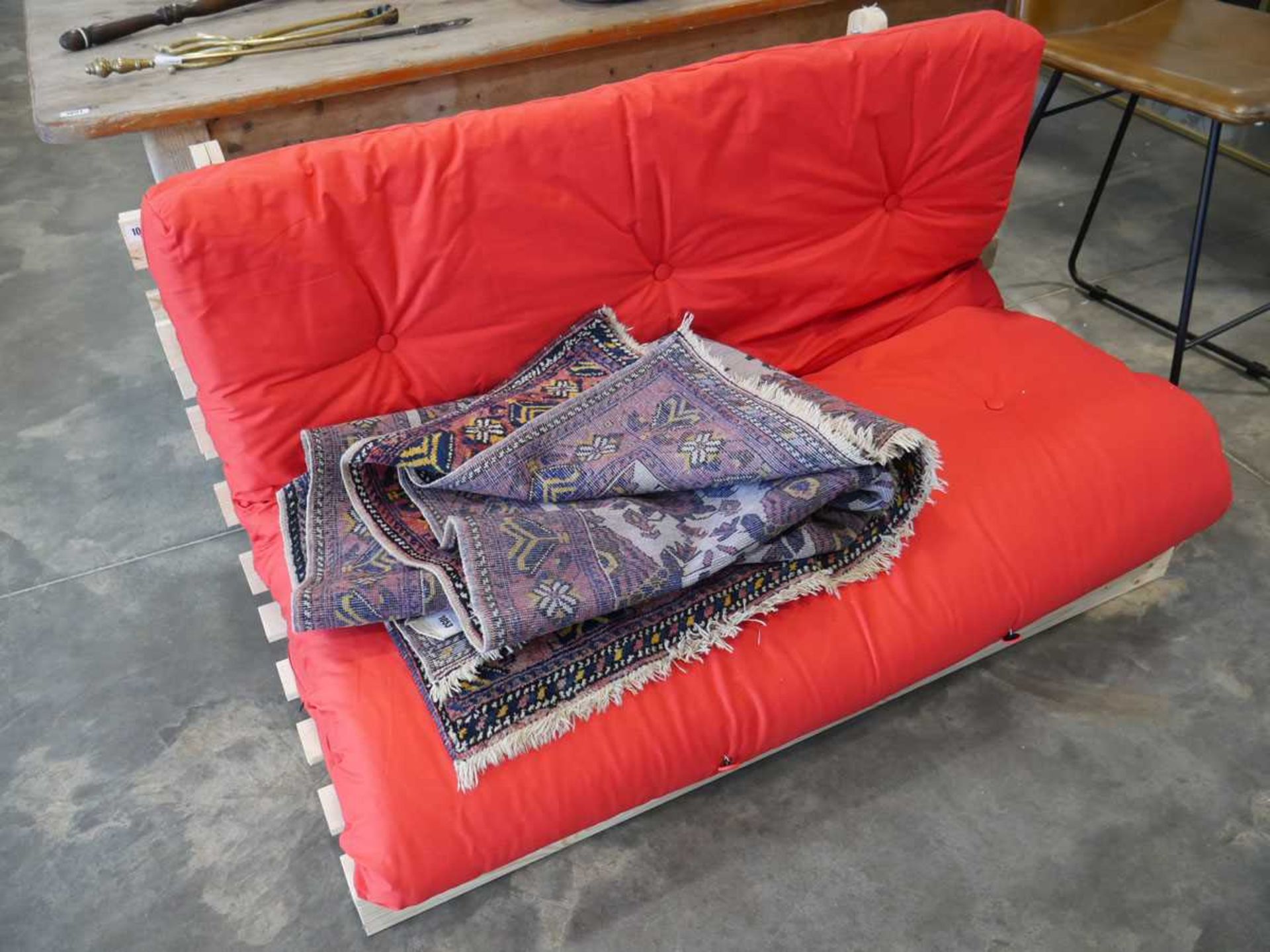 Pine framed double futon with red mattress