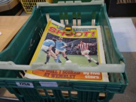 Crate containing various 'Shoot' football magazines from the 1970s